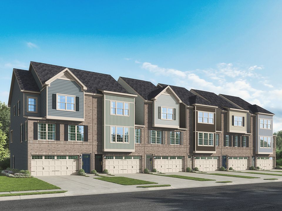 Grand Townhomes with Private Garages and Driveway Parking