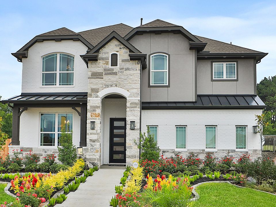 Exquisite stone and brick facade blend effortlessly in this Katy Lakes gem, surrounded by vibrant la