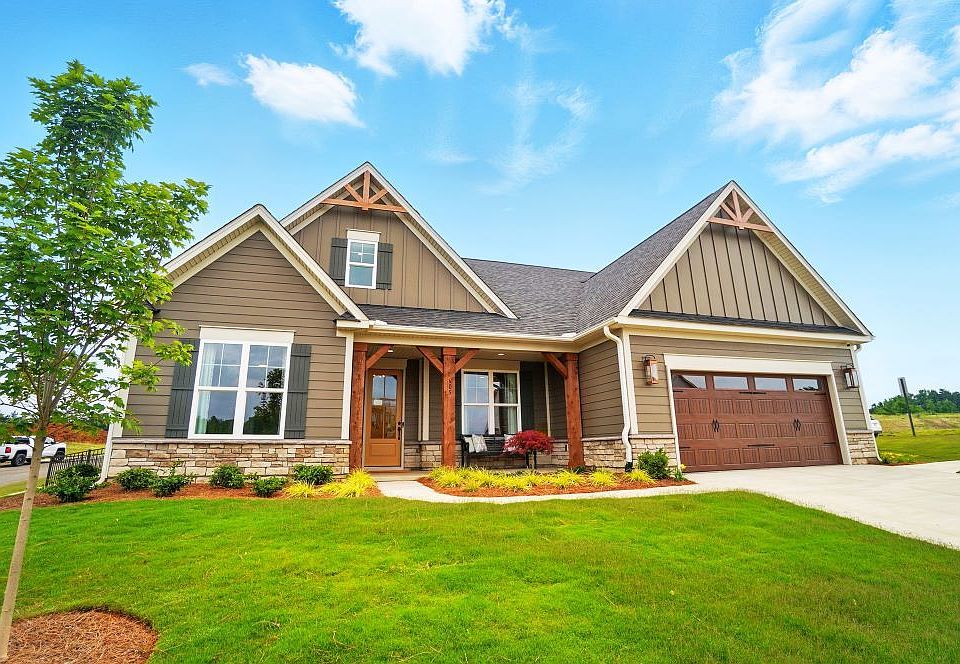 2 story home with a first floor main bedroom