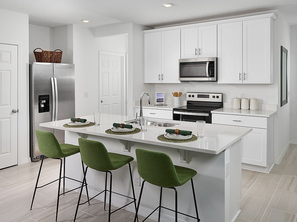 Kitchen in the Summit floorplan at The Meadow at Crossprairie