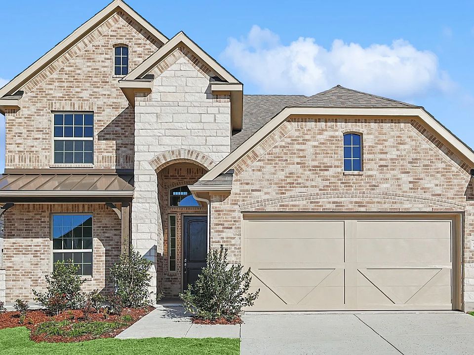 Experience elegance with this Infinity Square home featuring exquisite brickwork and a gabled roof.