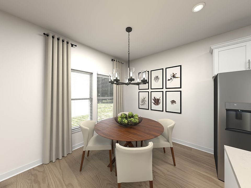 The open-concept floorplan allows for an easy flow between the kitchen and dining areas.