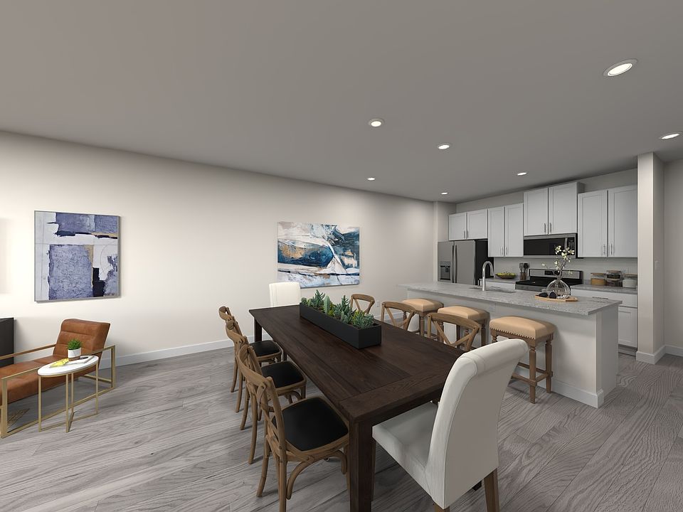The main-level is perfect for hosting elegant dinner parties or relaxing with friends.