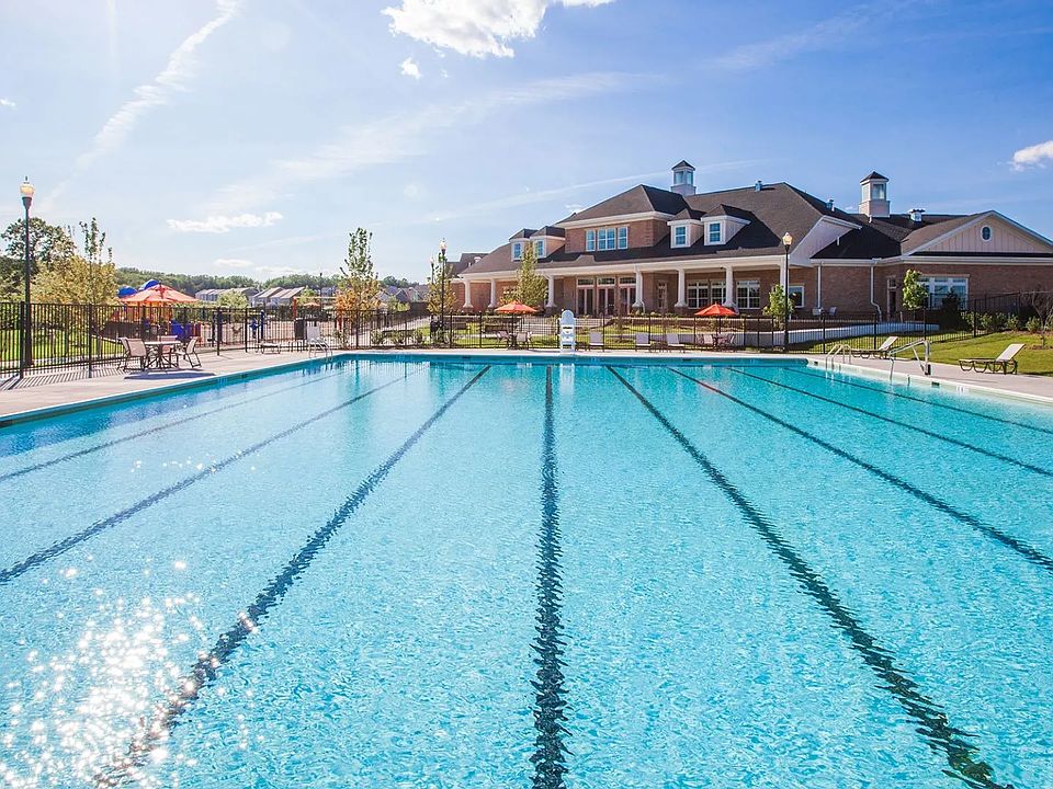 Stunning Pool with Loungers Located at the Clubhouse in the Parkside Community