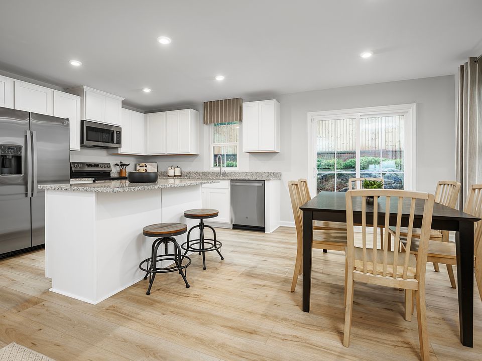 Open House Sat. Sun. 1-4 PM. TOUR NEW TOWNHOMES WITH A GARAGE