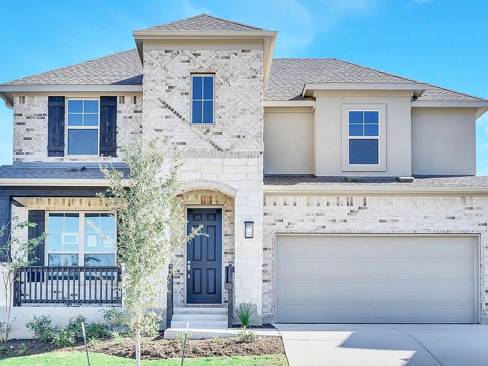 Luxurious brick facade and modern design in the exclusive Mirador community.