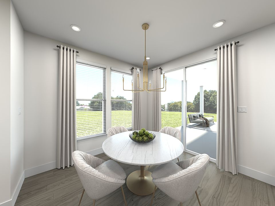 The open-concept floorplan allows for an easy flow between the kitchen and dining areas.