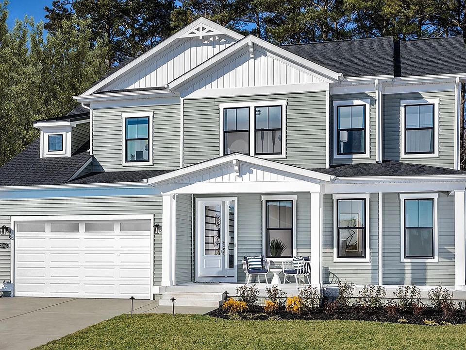 The exterior front of a DRB Homes Barbados Model at the Sycamore Chase Community.