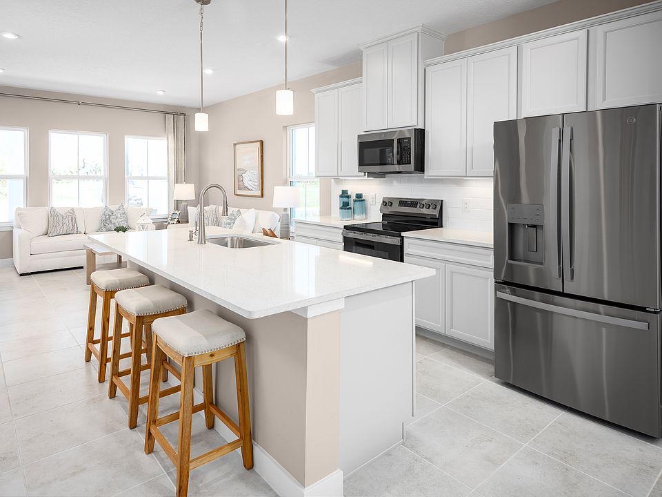 Low-maintenance townhomes in DeBary with porches, lofts, and resort-style amenities near shops.