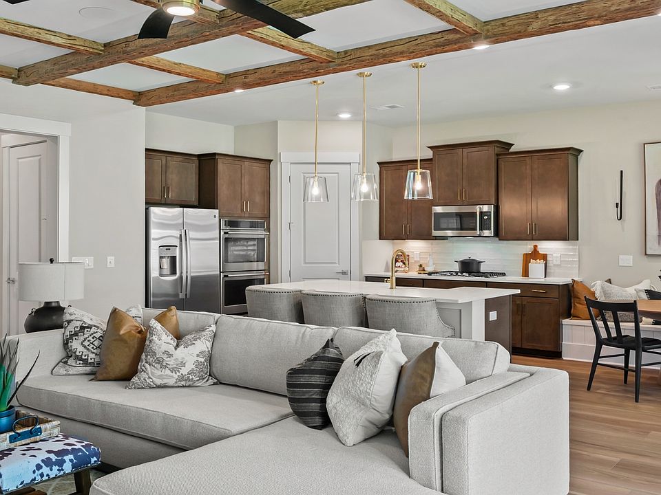 The Traveler s open kitchen and living room create a welcoming space for daily living and gatherings