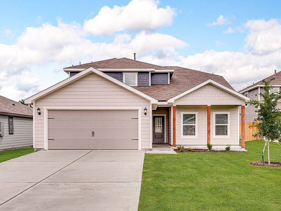 The Cypress is a beautiful two-story home with a siding exterior and wood details.