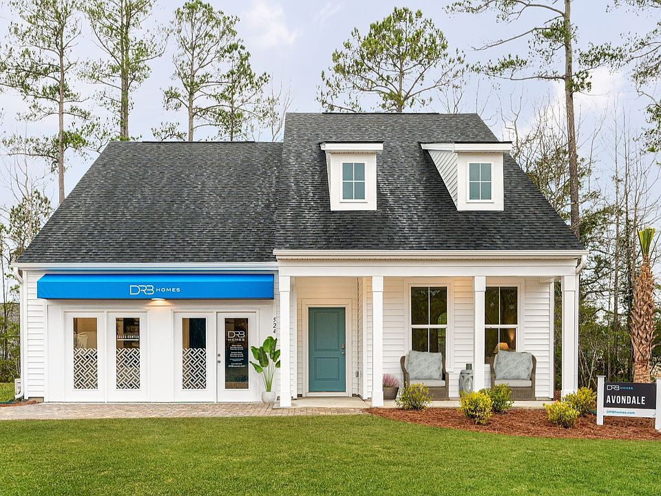 The Avondale model in Bluffs at Sun Colony by DRB homes offering a full front porch with its exterio